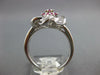 1.08CT DIAMOND & AAA PINK SAPPHIRE 18KT WHITE GOLD ROUND & BAGUETTE FLOWER RING