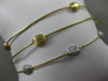 ESTATE .42CT DIAMOND 14KT TWO TONE GOLD HAMMERED BY THE YARD BANGLE BRACELET