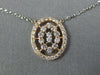 ESTATE .41CT DIAMOND 14KT WHITE AND ROSE GOLD 3D OVAL BY THE YARD LOVE PENDANT
