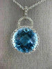 ESTATE LARGE 6.60CT DIAMOND & BLUE TOPAZ 14KT WHITE GOLD HALO ROUND HALO PENDANT