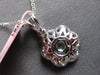 ESTATE 1.12CT DIAMOND & AAA RUBY 14KT WHITE GOLD CLASSIC FLOWER FLOATING PENDANT