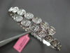 2.67CT DIAMOND 18K WHITE GOLD OVAL BEZEL INVISIBLE SEMI ETERNITY BANGLE BRACELET