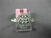 ESTATE .82CT DIAMOND 18K WHITE GOLD 3D ROUND & PRINCESS 4 STONE FLOWER HALO RING
