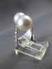 WIDE .23CT DIAMOND & AAA SOUTH SEA PEARL 18KT WHITE GOLD CRISS CROSS LOVE RING