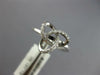 ESTATE .13CT DIAMOND 18KT WHITE GOLD 3D CLASSIC LOVE KNOT FLOWER STAR RING