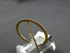 ESTATE .22CT DIAMOND 18KT YELLOW GOLD 3D ROUND CRISS CROSS INFINITY LOVE RING