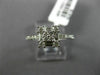 ESTATE .57CT ROUND & BAGUETTE DIAMOND 18KT WHITE GOLD CLUSTER SEMI ETERNITY RING