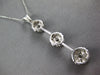 1.06CT DIAMOND 14KT WHITE GOLD FLOWER PAST PRESENT FUTURE JOURNEY LOVE PENDANT