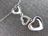 .06CT DIAMOND 14KT WHITE GOLD 3D OPEN HEART JOURNEY PAST PRESENT FUTURE PENDANT