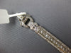 WIDE 4.80CT DIAMOND 18KT WHITE GOLD ROUND & BAGUETTE LOVE KNOT TENNIS BRACELET
