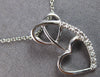 ESTATE .03CT DIAMOND 14KT WHITE GOLD 3D DOUBLE HEART LOVE FLOATING PENDANT
