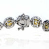 LARGE 12.84CT WHITE & FANCY YELLOW DIAMOND 18KT 2 TONE GOLD HALO TENNIS BRACELET