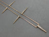 ESTATE .15CT ROUND DIAMOND 14KT ROSE GOLD 3D BY THE YARD SPIKY FLOATING PENDANT
