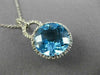ESTATE LARGE 6.60CT DIAMOND & BLUE TOPAZ 14KT WHITE GOLD HALO ROUND HALO PENDANT