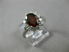 ESTATE 1.45CT DIAMOND & NATURAL GARNET 18KT WHITE GOLD OVAL HALO ENGAGEMENT RING