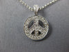 ESTATE .30CT DIAMOND 14KT WHITE GOLD CIRCLE OF LIFE PEACE SIGN FLOATING PENDANT