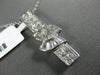 ESTATE 1.36CT DIAMOND 18KT WHITE GOLD PRINCESS ROUND & BAGUETTE BAR BOW PENDANT