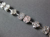 3.98CT DIAMOND 18KT WHITE GOLD INVISIBLE FLOWER OVAL BY THE YARD TENNIS BRACELET