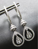 .83CT DIAMOND 18KT WHITE GOLD CLUSTER TEAR DROP DOUBLE SWIRL HANGING EARRINGS
