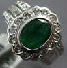 WIDE 2.19CT DIAMOND & EMERALD 18KT WHITE GOLD OVAL ROUND & BAGUETTE FLOWER RING