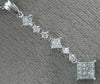 ESTATE LONG .56CT DIAMOND 18K WHITE GOLD CLASSIC JOURNEY INVISIBLE PENDANT 19808