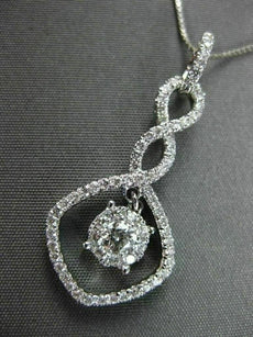 ANTIQUE .67CT ROUND DIAMOND 18KT WHITE GOLD INFINITY FLOATING PENDANT & CHAIN