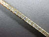 ESTATE 4.54CT DIAMOND 14K YELLOW GOLD PRINCESS CHANNEL INVISIBLE TENNIS BRACELET