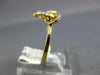 ESTATE .13CT DIAMOND 18KT YELLOW GOLD 3D LOVE KNOT FLOWER STAR FUN RING