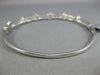 ESTATE WIDE 1.24CT DIAMOND 18KT WHITE GOLD ROUND INFINITY FLOWER BANGLE BRACELET