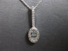 .25CT DIAMOND 14KT WHITE GOLD 3D ROUND & BAGUETTE OVAL TENNIS RACKET FUN PENDANT