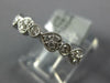ESTATE .59CT DIAMOND 18KT WHITE GOLD 3D HEART SHAPE ETERNITY ANNIVERSARY RING