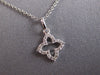 ESTATE SMALL .08CT DIAMOND 14KT WHITE GOLD 3D FLOWER STAR FLOATING PENDANT