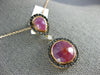 7.73CT BLACK DIAMOND & AAA SLICED RUBY 18KT ROSE GOLD CIRCULAR TEAR DROP PENDANT