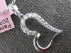 ESTATE .24CT DIAMOND 14KT WHITE GOLD CLASSIC ROUND OPEN HEART FLOATING PENDANT