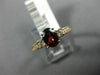 1.40CT ROUND DIAMOND & OVAL RHODOLITE 14KT ROSE GOLD THREE STONE ENGAGEMENT RING
