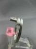 ESTATE WIDE 18KT WHITE GOLD FUN RING. 3D CLUSTER CRISS CROSS ETOILE DESIGN
