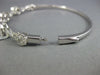 ESTATE WIDE 1.76CT DIAMOND 18KT WHITE GOLD 3D INFINITY FLOWER BANGLE BRACELET