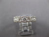 ESTATE .90CT DIAMOND 18KT WHITE GOLD 3D CLASSIC 7 STONE HALO ANNIVERSARY RING