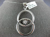 ESTATE LARGE .19CT DIAMOND 18KT WHITE GOLD FLOWER LOVE KNOT CIRCULAR FUN PENDANT