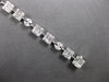 4.22CT DIAMOND 18KT WHITE GOLD ROUND BAGUETTE & MARQUISE SQUARE TENNIS BRACELET