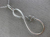 ESTATE LARGE .42CT ROUND DIAMOND 14KT WHITE GOLD 3D INFINITY FLOWER LOVE PENDANT