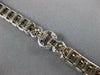 WIDE 4.80CT DIAMOND 18KT WHITE GOLD ROUND & BAGUETTE LOVE KNOT TENNIS BRACELET