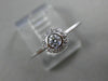 ESTATE .15CT DIAMOND 18KT WHITE GOLD CLASSIC FLOWER HALO BEZEL FRIENDSHIP RING