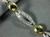 ESTATE WIDE 1.20CT DIAMOND 14KT WHITE & YELLOW GOLD OVAL TENNIS BRACELET #11318