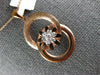 ESTATE .19CT DIAMOND 18KT ROSE GOLD 3D FLOWER CIRCULAR LOVE KNOT FUN PENDANT