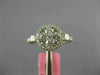 ESTATE .86CT DIAMOND 18KT WHITE GOLD 3D ROUND & PRINCESS FLOWER HALO LOVE RING
