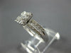ESTATE .42CT DIAMOND 18KT WHITE GOLD ROUND & BAGUETTE CLASSIC CLUSTER FUN RING