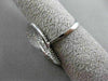 ESTATE LARGE .88CT ROUND DIAMOND 18K WHITE GOLD 3D PAVE INFINITY OVAL LOVE RING