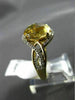 ESTATE 3.09CT DIAMOND & EXTRA FACET YELLOW TOPAZ 14KT YELLOW GOLD INFINITY RING