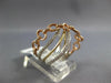 WIDE .48CT DIAMOND 14KT WHITE & ROSE GOLD MULTI ROW CRISS CROSS LOVE KNOT RING